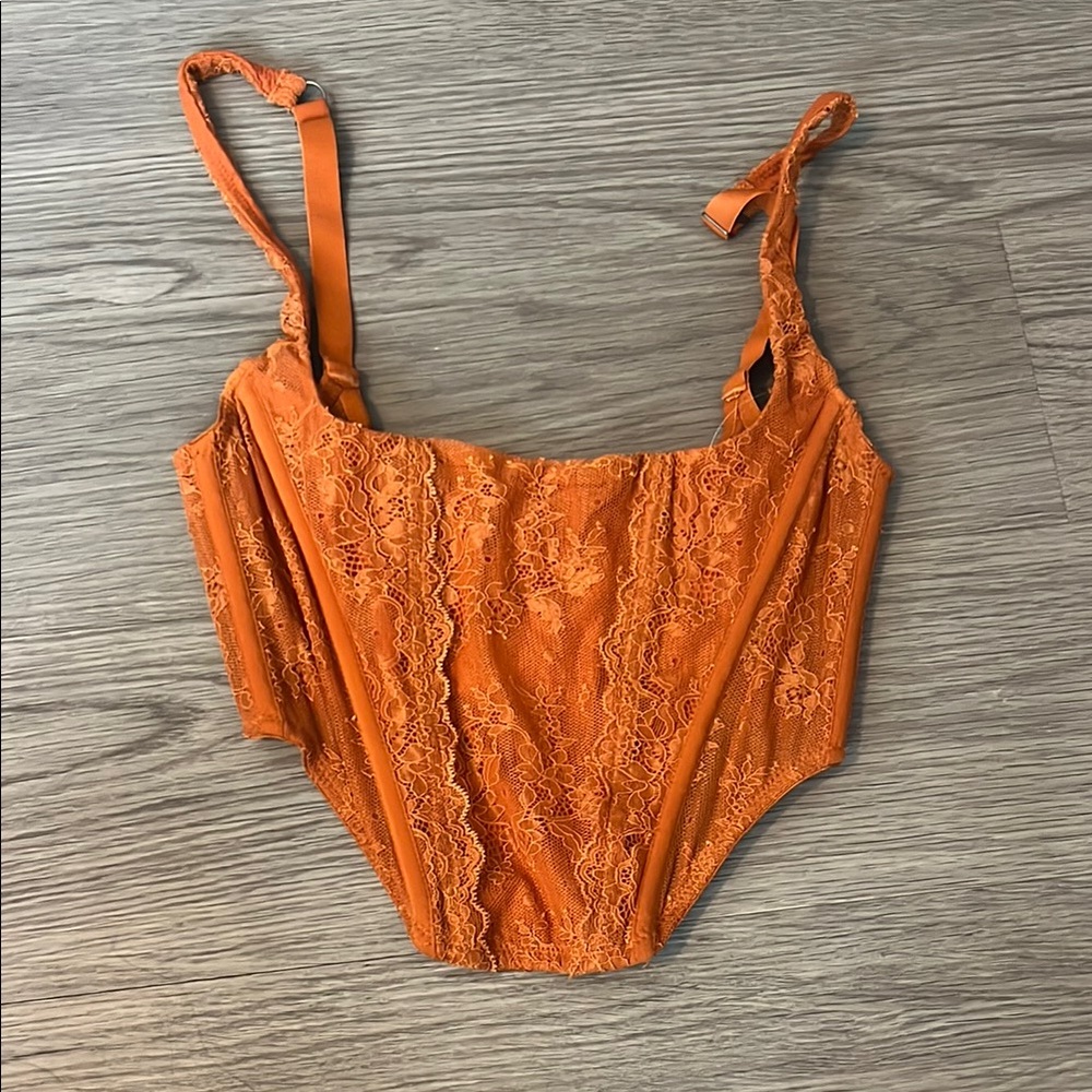 out from under corset 🧡